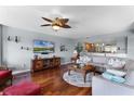 Cozy living room showcasing hardwood floors, stylish furnishings, and an open floor plan at 4 Oceans West Blvd # 502D, Daytona Beach Shores, FL 32118