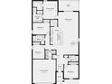 Detailed floor plan showcasing the layout of the four-bedroom home, including the kitchen and great room at 7415 Sandstone Dr, Groveland, FL 34736