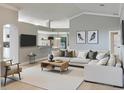 Bright living room with an open layout, neutral color palette, and modern furniture at 2360 Brewerton Ln, Orlando, FL 32824