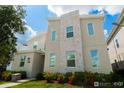 Beautiful two-story home features stylish design, well-maintained landscaping, and inviting front entrance at 2816 Simile St, Kissimmee, FL 34746