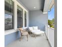 Inviting porch with comfortable seating, perfect for enjoying the outdoors and relaxing in style at 452 Diamond Dove Cv, Winter Springs, FL 32708