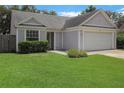 Inviting single-Gathering home with a neatly kept lawn and a convenient two-car garage at 1026 Mccully Ct, Oviedo, FL 32765