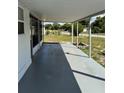 Covered back patio with concrete flooring and view of the backyard at 2302 Greenwood St St, Deltona, FL 32738