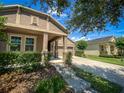 Attractive home exterior featuring a well-maintained lawn and convenient driveway for easy access at 12795 Bosworth Ave, Windermere, FL 34786