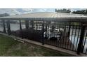 Secure boat lift in a fenced waterfront property at 1811 Missouri Ave, Sanford, FL 32771