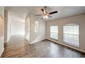 Open-concept living room showcasing unique architectural details and lots of natural light at 1373 Burnley Ct, Kissimmee, FL 34758