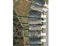 Aerial view showcases well-maintained backyards and the layout of homes in the neighborhood at 3028 Lakes Crest Ave, St Cloud, FL 34772