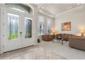 Bright living room with tile floors, neutral walls, and modern furniture at 748 Duff Dr, Winter Garden, FL 34787