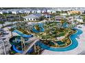 Resort-style community with lazy river, water slides, and lush landscaping perfect for families and relaxation at 3193 Pequod Pl, Kissimmee, FL 34746