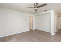 Bright living room featuring modern flooring and a stylish accent wall at 85 Levee Ln, Ormond Beach, FL 32174