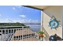 Charming balcony with a nautical theme, offering a serene spot to unwind and enjoy picturesque water views at 145 N Halifax Ave # 705, Daytona Beach, FL 32118