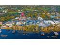 Exclusive waterfront home in a beautiful community, offering stunning lake views at 7011 Via Carmel Way, Orlando, FL 32819