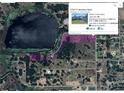 Aerial view of the property lines and neighboring area including a lake and roads at 17927 E Apshawa Rd, Minneola, FL 34715