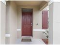 Up-close view of a home's front door, showcasing its architectural style and welcoming entrance at 4644 Bernard Blvd, Haines City, FL 33844