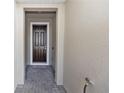 A covered entryway welcomes visitors with a dark wood door and a charming 'Welcome' mat at 4733 Cliveden Loop, Sanford, FL 32773