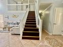 Beautiful staircase with tile flooring at 1212 Bradwell Dr, Orlando, FL 32837