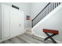 Inviting foyer features staircase, stylish floors, and a classic design at 14252 Anastasia Ln, Orlando, FL 32828