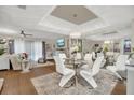 Beautifully decorated living space featuring a dining area, comfortable seating, and bright natural light at 240 Killarney Bay Ct # 4, Winter Park, FL 32789
