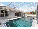 Sparkling pool and screen enclosed patio offering an ideal outdoor experience at 2865 Ashton Ter, Oviedo, FL 32765
