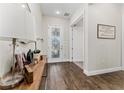 Beautiful entryway with wood-look tile, a glass door and natural light at 15716 Sweet Lemon Way, Winter Garden, FL 34787