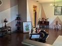 Spacious living room with hardwood flooring and comfortable furniture for relaxing and entertaining at 2932 Silver Ridge Dr, Orlando, FL 32818