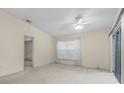 Bright bedroom with a ceiling fan and a large window providing plenty of natural light at 1032 Calanda Ave # 1032, Orlando, FL 32807