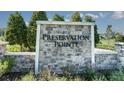 Stone entrance sign for Preservation Pointe, a beautiful residential community at 317 Preserve Pointe Blvd, Davenport, FL 33837