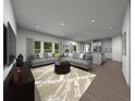 Spacious living room with two sofas, recessed lighting, large windows, and an open floor plan at 3674 Portsmouth Ln, Haines City, FL 33844