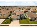 Aerial view of home in a residential area, showcasing the property's landscaping and neighborhood at 5846 Sw 80Th Ln, Ocala, FL 34476