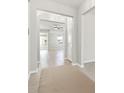 Inviting foyer with views to the living areas, tile floors, and neutral paint at 5846 Sw 80Th Ln, Ocala, FL 34476