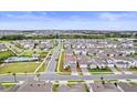 Overhead view of a residential neighborhood showcasing the layout and community amenities at 19105 Planetree St, Orlando, FL 32827
