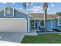 A well maintained home shows a welcoming entrance to the home at 3256 Amber St, Deltona, FL 32738