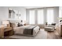 Serene bedroom with plush bedding, natural light, and contemporary furnishings at 917 Lake Emerald Dr, Orlando, FL 32806