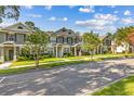 Inviting townhome community showcases meticulous landscaping and well-manicured greenery at 12449 Cruxbury Dr, Windermere, FL 34786