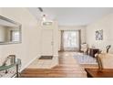 Inviting foyer with tile and hardwood flooring and lots of natural light at 253 Clydesdale Cir, Sanford, FL 32773