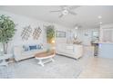 Bright and airy living room featuring neutral decor, cozy seating, and stylish accents at 1785 Red Canyon Dr, Kissimmee, FL 34744