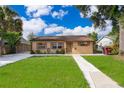 Lovely single-story house boasting a fresh lawn and quaint curb appeal at 2918 E Central Blvd, Orlando, FL 32803
