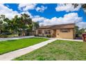 Inviting single-story home showcasing green grass and easy street access at 2918 E Central Blvd, Orlando, FL 32803