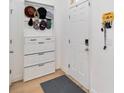 Foyer with a white organizer and hooks at 12255 Joshua Tree Trl, Windermere, FL 34786