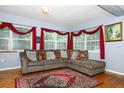 Cozy living room with a comfortable sofa, decorative pillows, and a warm, inviting atmosphere at 3501 Amigos Ave, Orlando, FL 32808