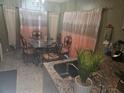 Cozy dining area featuring elegant table set and stylish decor at 679 Midori St, Orlando, FL 32811