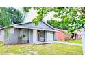 Charming single-story home with a well-maintained lawn and driveway, attached one car garage at 3362 Janet St, Apopka, FL 32712