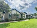 Charming home with lush landscaping and mature trees offers great curb appeal at 3417 Bay Meadow Ct, Windermere, FL 34786