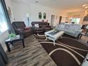 Spacious living room featuring modern furnishings and stylish decor at 744 Barron Pl, The Villages, FL 32163