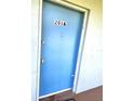 Blue front door marked 201A with a peephole and two locks at 333 Lake Howard Nw Dr # 201A, Winter Haven, FL 33880
