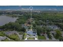 Aerial shot of the property showcasing its prime location near the lake and lush greenery at 6317 Cheryl St, Orlando, FL 32819