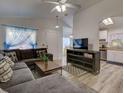 Inviting living room connects seamlessly to the kitchen with modern appliances and an archway entrance at 5123 Pineland Ave, Port Orange, FL 32127