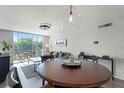 Bright and airy living room with a balcony, perfect for enjoying the views at 1100 Delaney Ave # F407, Orlando, FL 32806