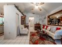Cozy living room featuring tile flooring, an accent rug, and comfortable seating at 1603 15Th, Sanford, FL 32771