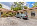 A well-maintained exterior, highlighting ample parking and landscaping at 1710 Espanola Ave, Daytona Beach, FL 32117